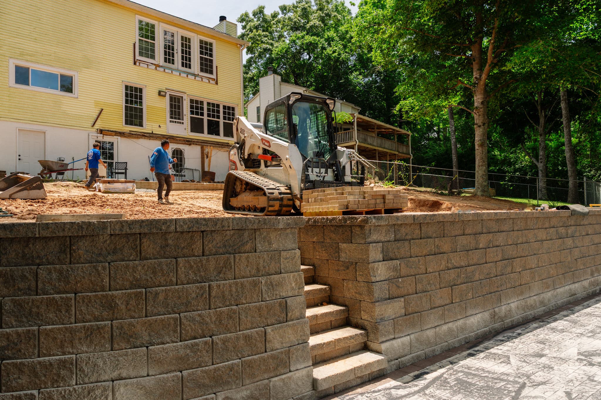 Project Tiered Retaining Walls Setting the Stage for a Lakeview Paver Patio image