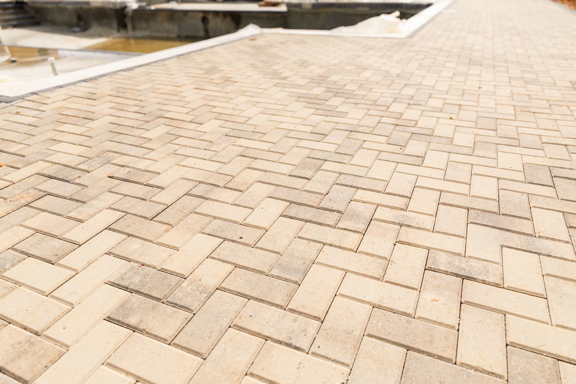 Gallery photos for Poolside Paver Install Taking Shape at This Complex: Image #2