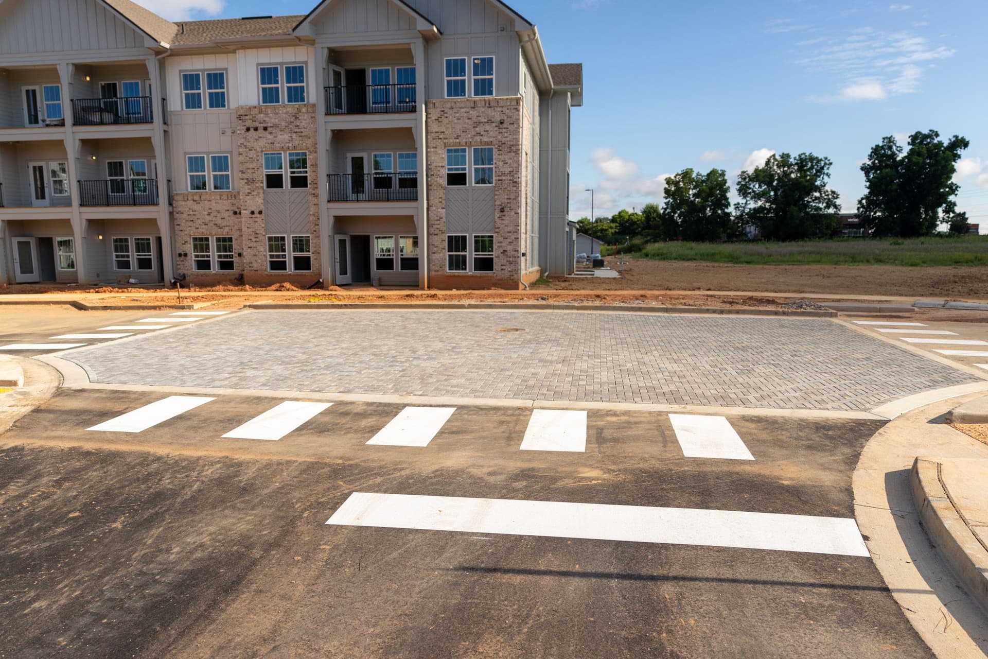 Gallery photos for Herringbone Paver Intersection Install at Fulton County Apartment Complex: Image #4