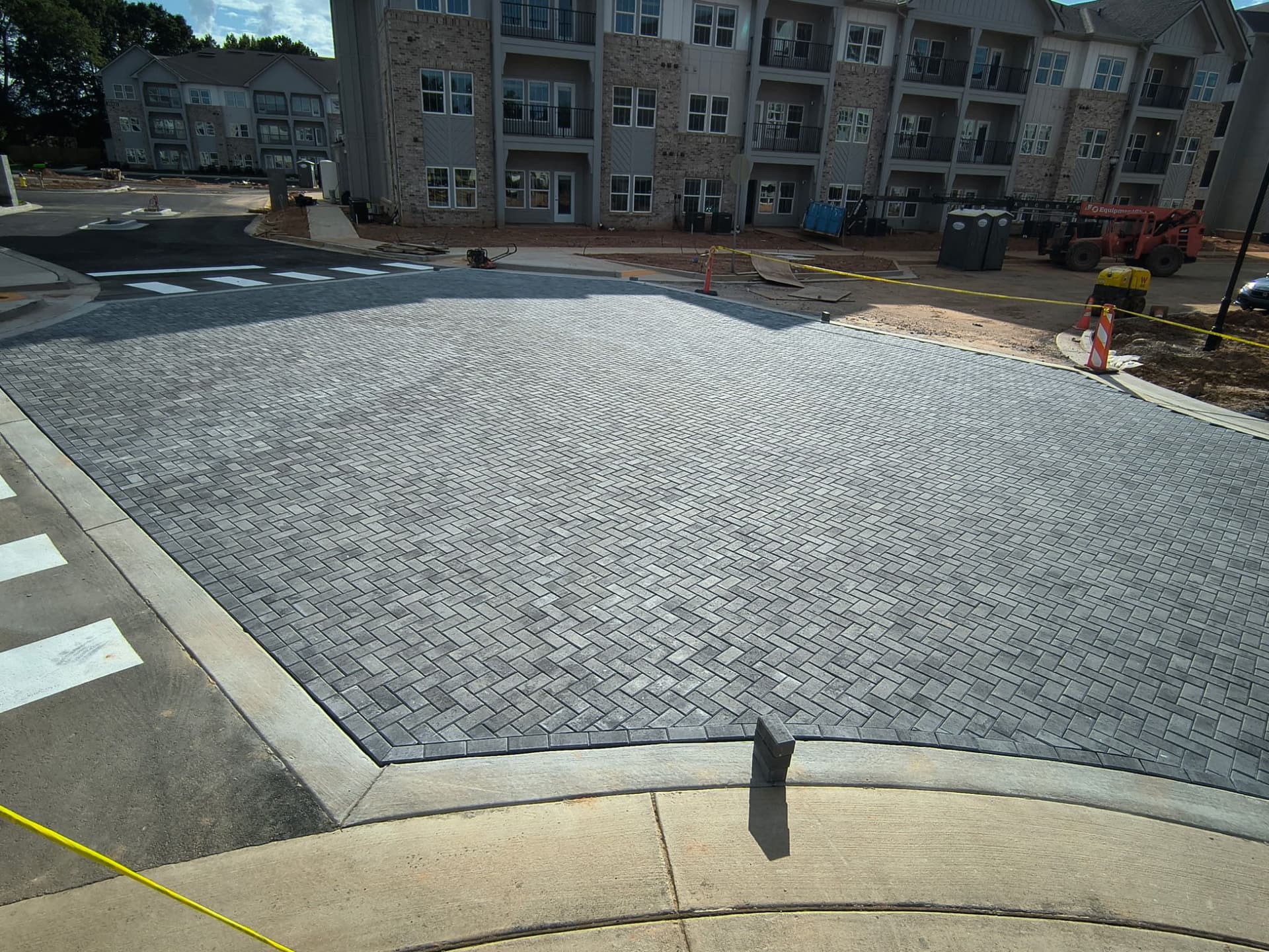 Gallery photos for Herringbone Paver Intersection Install at Fulton County Apartment Complex: Image #5
